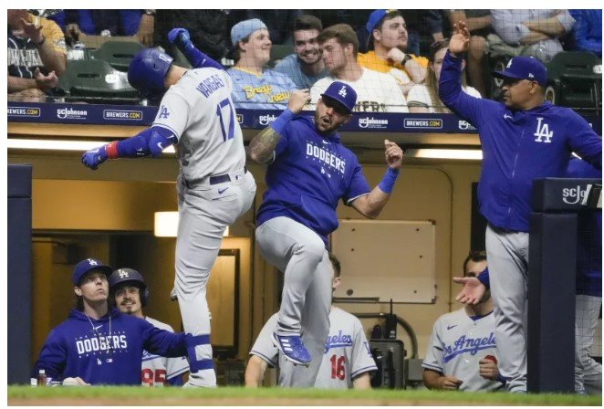 Victor Caratini's two-run single in 11th lifts Brewers over Dodgers